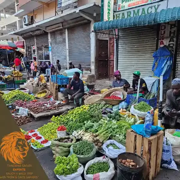 Local market in Dar es Salaam with fresh vegetables and street vendors