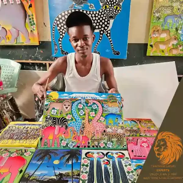 Tinga Tinga artist painting colorful artwork in Dar es Salaam