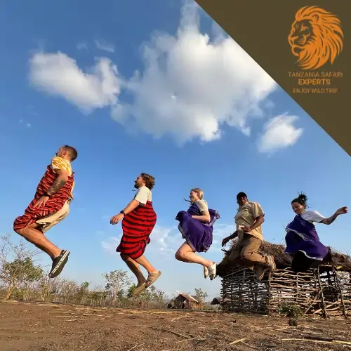 Visitors with Maasai people during a cultural visit in Tanzania